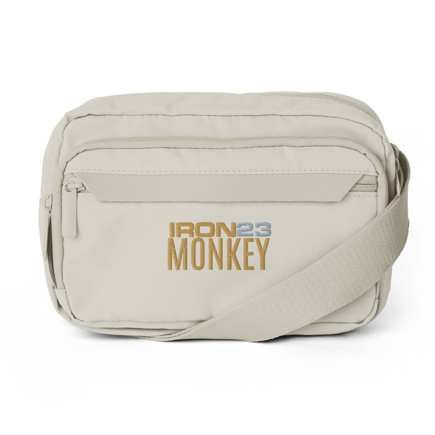 Recycelte Polyester-Umhängetasche von Sportswear Iron Monkey 23, kompakte Urban Crossbody Bag in natürlichem Steinfarben.
