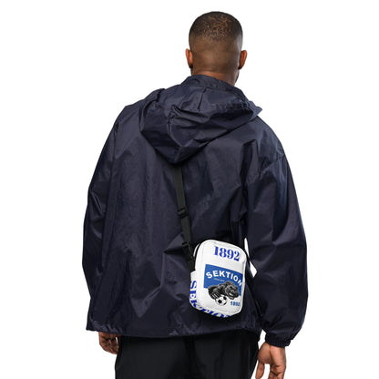 All-over-Print Umhängetasche von Sportswear Iron Monkey 23, weiße Utility-Crossbody-Tasche mit praktischem Design.