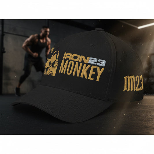 Schwarze, strukturierte Monkey Cord-Cap von Sportswear Iron Monkey 23, geschlossene Rückseite, links vorne sichtbar.