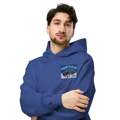 Unisex-Relax-Hoodie von Sportswear Iron Monkey 23 in Kobaltblau, Frontansicht, oversized und bequem, ideal für lässigen Stil.